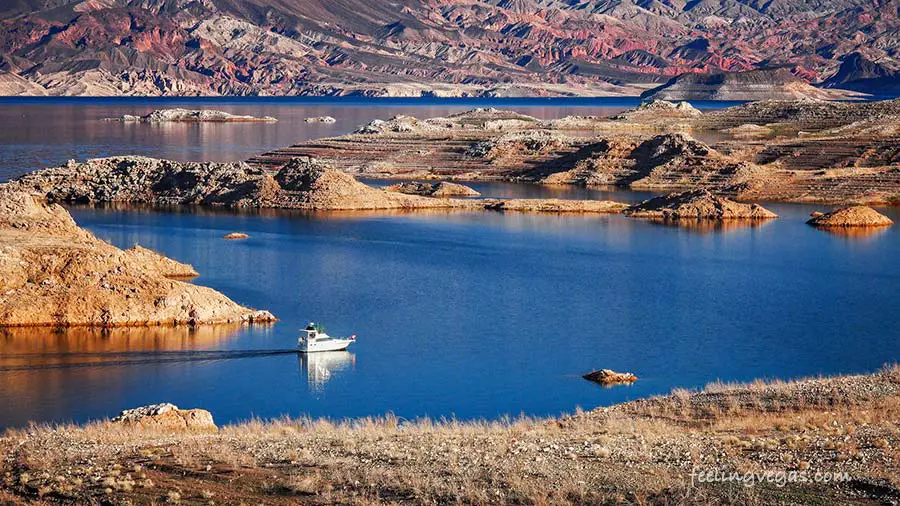 How Far Is The Grand Canyon From Las Vegas (North, South & West Rim Distance) 2 Boat on Lake Mead. You'll pass Lake Mead on the way to the Grand Canyon from Vegas