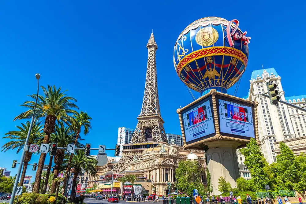 Las Vegas Strip FREE Walking Tour & Map (19 Must-See Stops!) 10 Tourists walking in front of Paris Las Vegas on the Strip