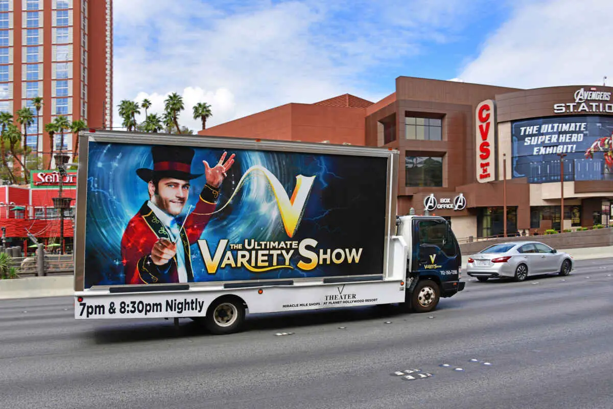 Is V The Ultimate Variety Show Worth It? (Know Before You Go) 1 Sign board advertising V The Ultimate Variety Show in Las Vegas